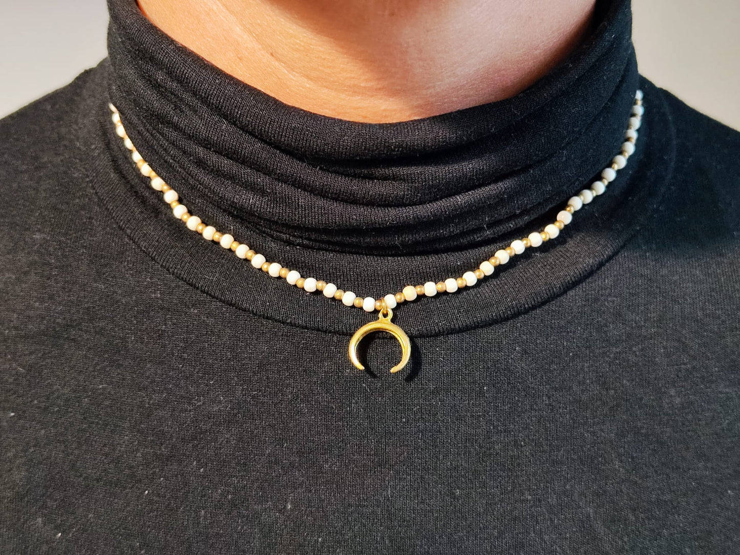 Beaded necklace with pendant
