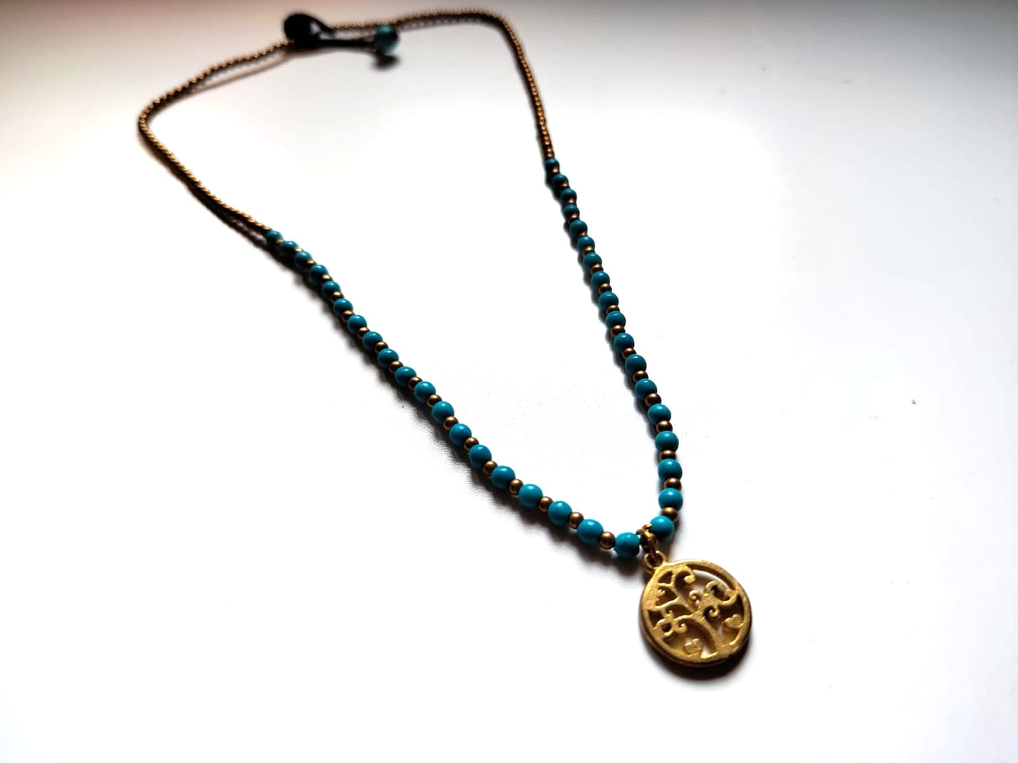 Beaded necklace with pendant