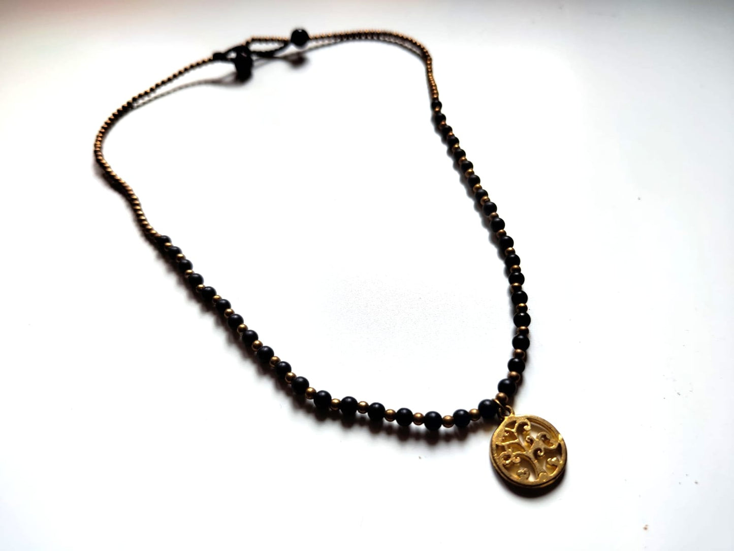 Beaded necklace with pendant
