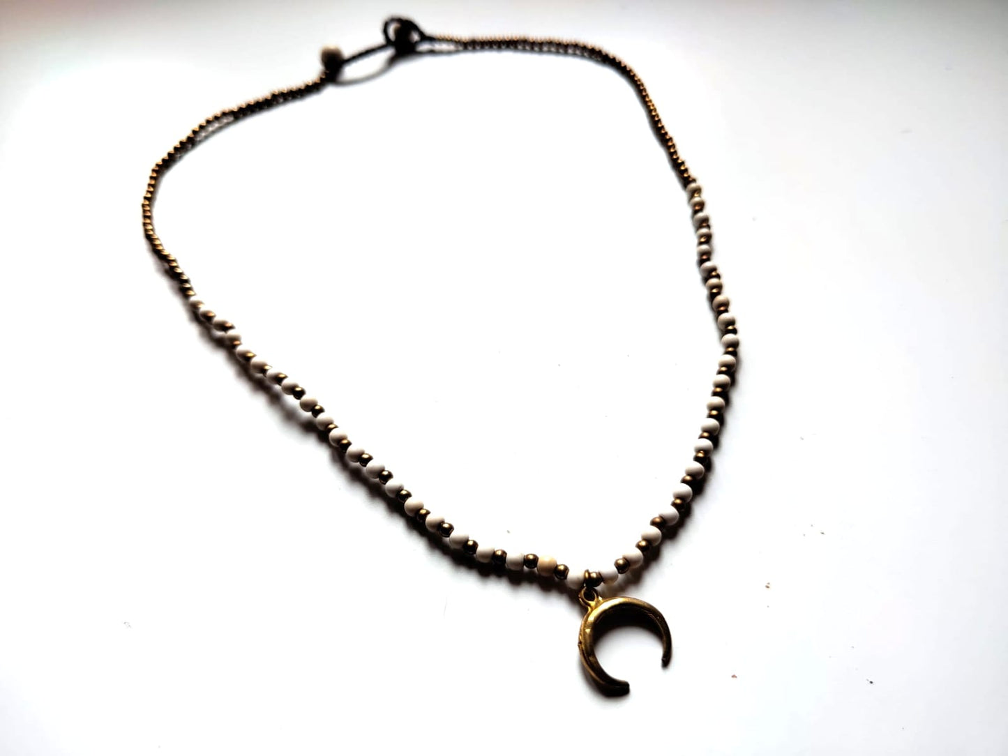 Beaded necklace with pendant